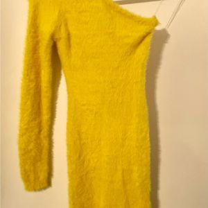 Yellow fuzzy one shoulder, long sleeve Fashionova dress.